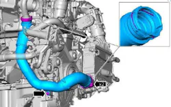 Charge air cooler intake pipe. Note the two retaining clips at the cooler.