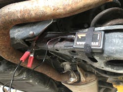 Example of a transmitter/transponder secured to a control arm. A wireless signal transmits results. Example of a transmitter/transponder secured to a control arm. A wireless signal transmits results.