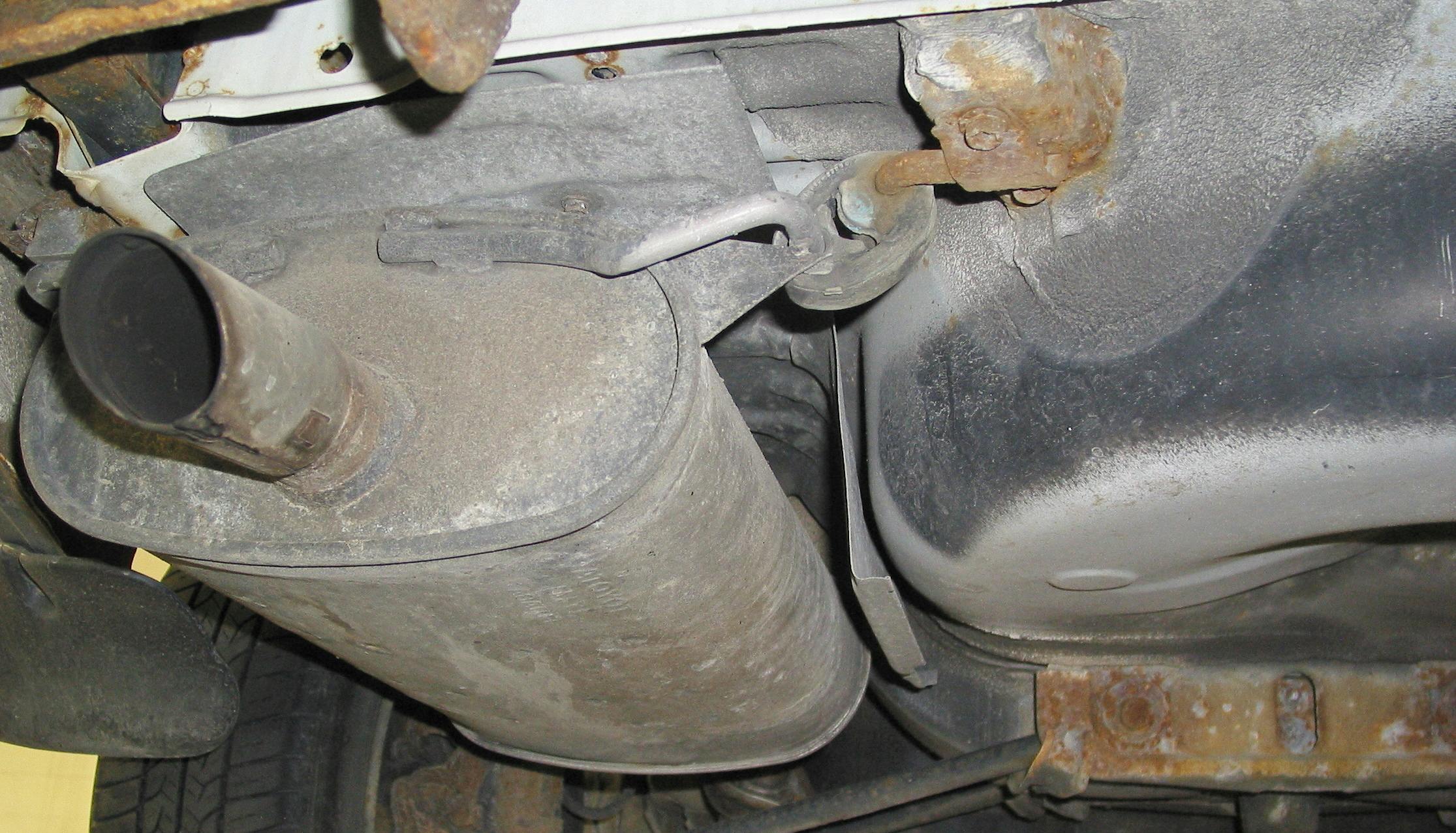 Undercar rattling/buzzing noises may be traced to worn or missing rubber hanger isolators, a corroded heat shield or an area of the exhaust system coming into contact with the underbody.
