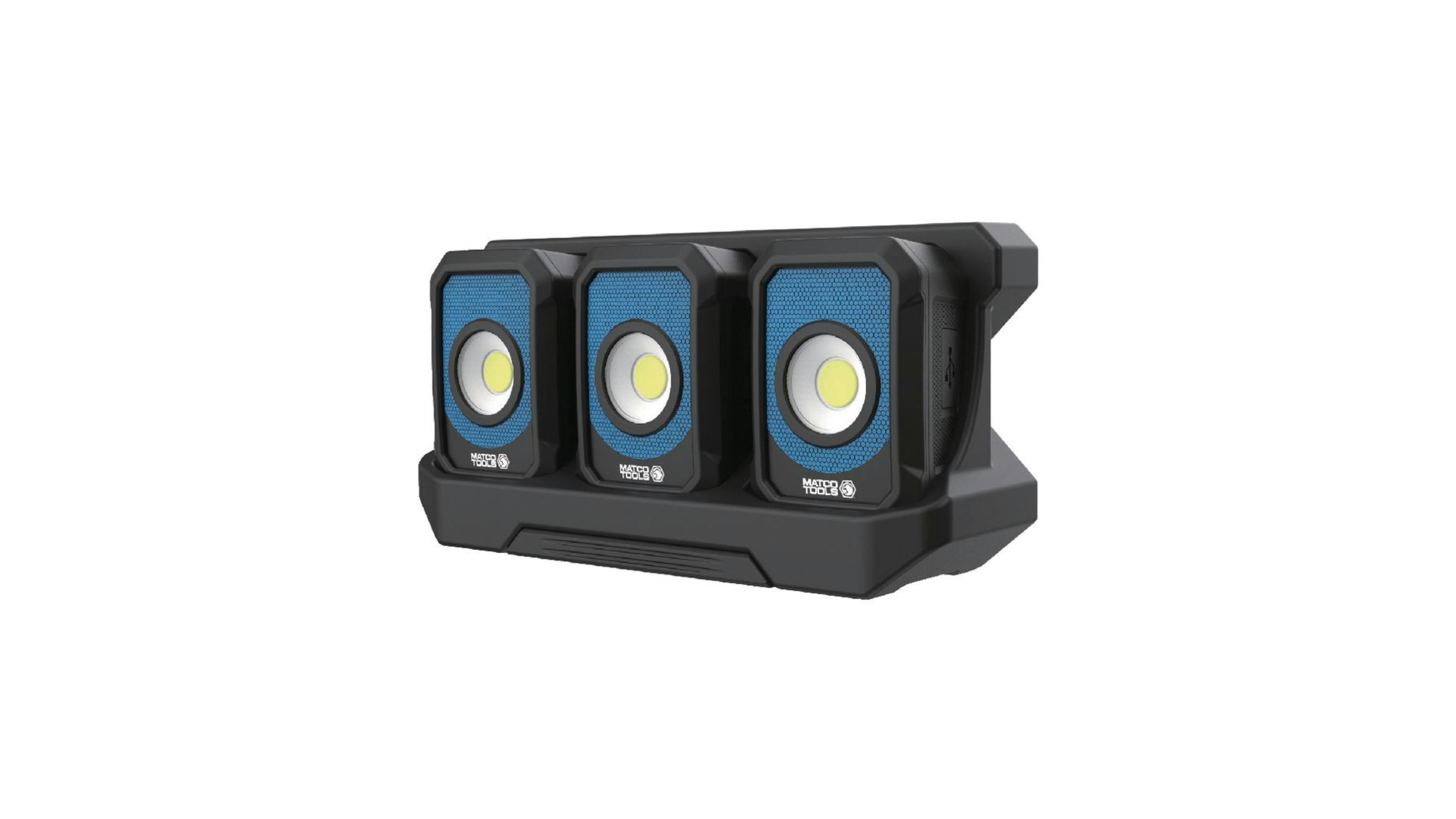 three rectangular work lights sit in a black plastic dock