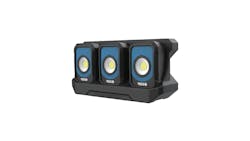 three rectangular work lights sit in a black plastic dock three rectangular work lights sit in a black plastic dock