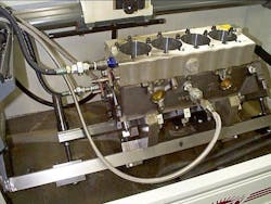 The hot honing unit is plumbed to the block on the honing machine. The theory is to attempt to simulate engine operating temperature (at least in terms of coolant temp) during honing. The hot honing unit is plumbed to the block on the honing machine. The theory is to attempt to simulate engine operating temperature (at least in terms of coolant temp) during honing.