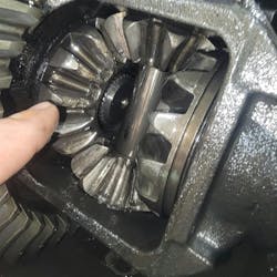 Fig. 5 - Failed differential internal kit. Note the chipped teeth on the side gear is a clear indicator of ingesting debris. Failure to fully clean the housing will cause a repeat failure. Fig. 5 - Failed differential internal kit. Note the chipped teeth on the side gear is a clear indicator of ingesting debris. Failure to fully clean the housing will cause a repeat failure.