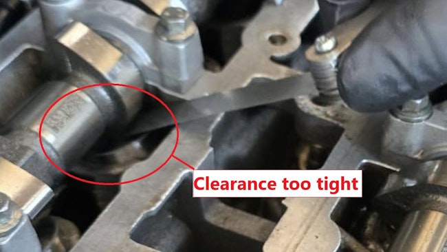 The rounded exhaust valve pocket and elevated intake manifold pressure come together like puzzle pieces inferring excessive valve overlap. Due to this valvetrain’s configuration, valve clearances are adjusted by way of selectable shims. The appropriate shim was chosen, and the clearances were brought back to within specification. The driveability symptom vanished, expected manifold vacuum was restored, and the fuel trim values nearly zeroed.