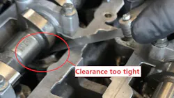 The rounded exhaust valve pocket and elevated intake manifold pressure come together like puzzle pieces inferring excessive valve overlap. Due to this valvetrain’s configuration, valve clearances are adjusted by way of selectable shims. The appropriate shim was chosen, and the clearances were brought back to within specification. The driveability symptom vanished, expected manifold vacuum was restored, and the fuel trim values nearly zeroed.