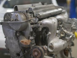 Fig. 5: This LIVC ICE shows the bellows built into the intake manifold. Fig. 5: This LIVC ICE shows the bellows built into the intake manifold.