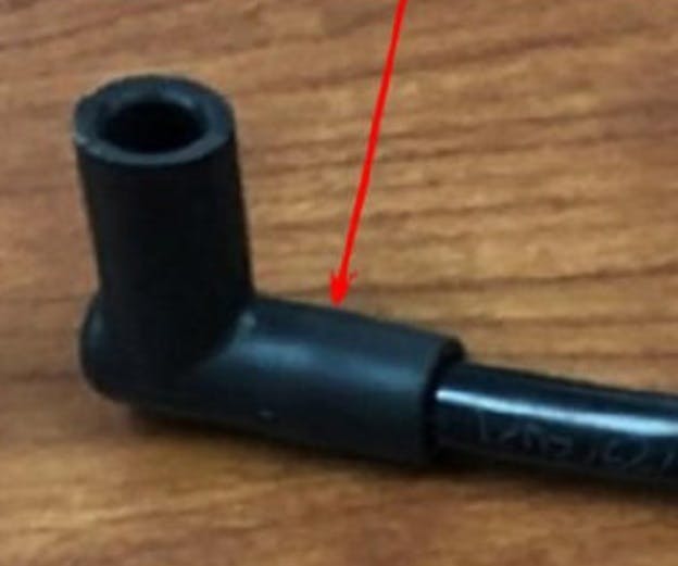 Example of a purge tube pushed too far into the elbow. Example of a purge tube pushed too far into the elbow.