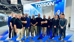 16 TOPDON employees in similar TOPDON-branded outfits smile together in front of a TOPDON booth at a convention 16 TOPDON employees in similar TOPDON-branded outfits smile together in front of a TOPDON booth at a convention