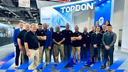 16 TOPDON employees in similar TOPDON-branded outfits smile together in front of a TOPDON booth at a convention 16 TOPDON employees in similar TOPDON-branded outfits smile together in front of a TOPDON booth at a convention