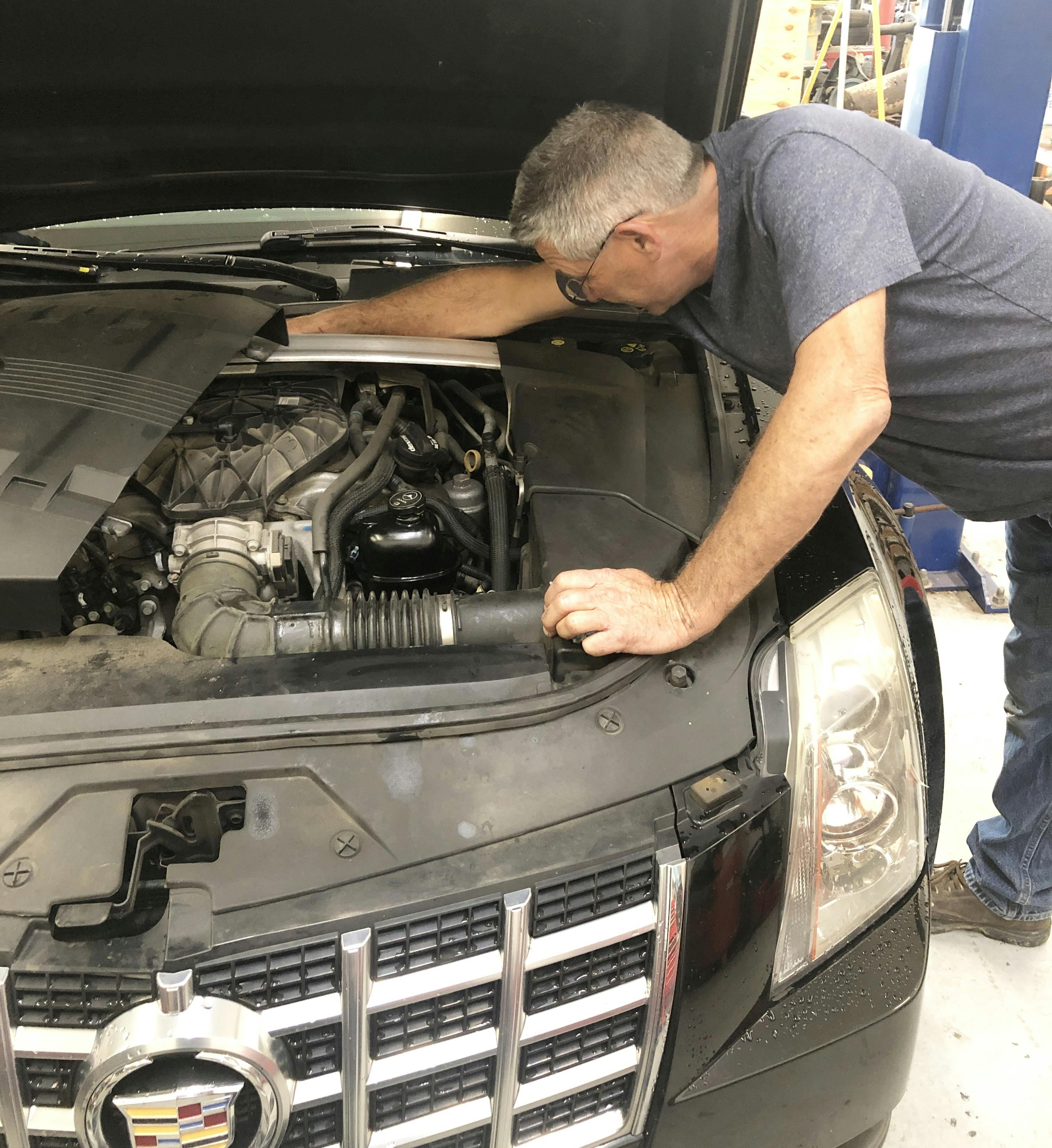 Bending over an engine bay and reaching can lead to lower back issues. While not always practical, try to reduce work performed while bent over.