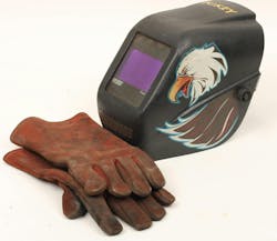 Example of auto-darkening wending helmet and heavy leather welding gloves with extended gauntlets. Example of auto-darkening wending helmet and heavy leather welding gloves with extended gauntlets.