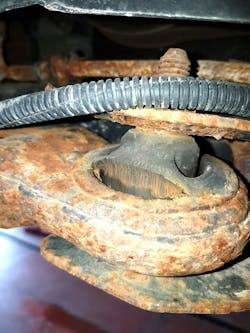 Worn or torn control arm bushings like this one can often cause issues with vehicle handling and possibly tire wear, these need to be checked and repaired before an alignment can be performed. Worn or torn control arm bushings like this one can often cause issues with vehicle handling and possibly tire wear, these need to be checked and repaired before an alignment can be performed.