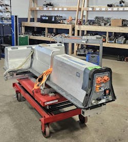 Chevy Volt Li-ion pack on factory lift fixture. Chevy Volt Li-ion pack on factory lift fixture.