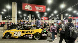 Attendees excitedly gather on the show floor after attending the Kick-Off Meeting.