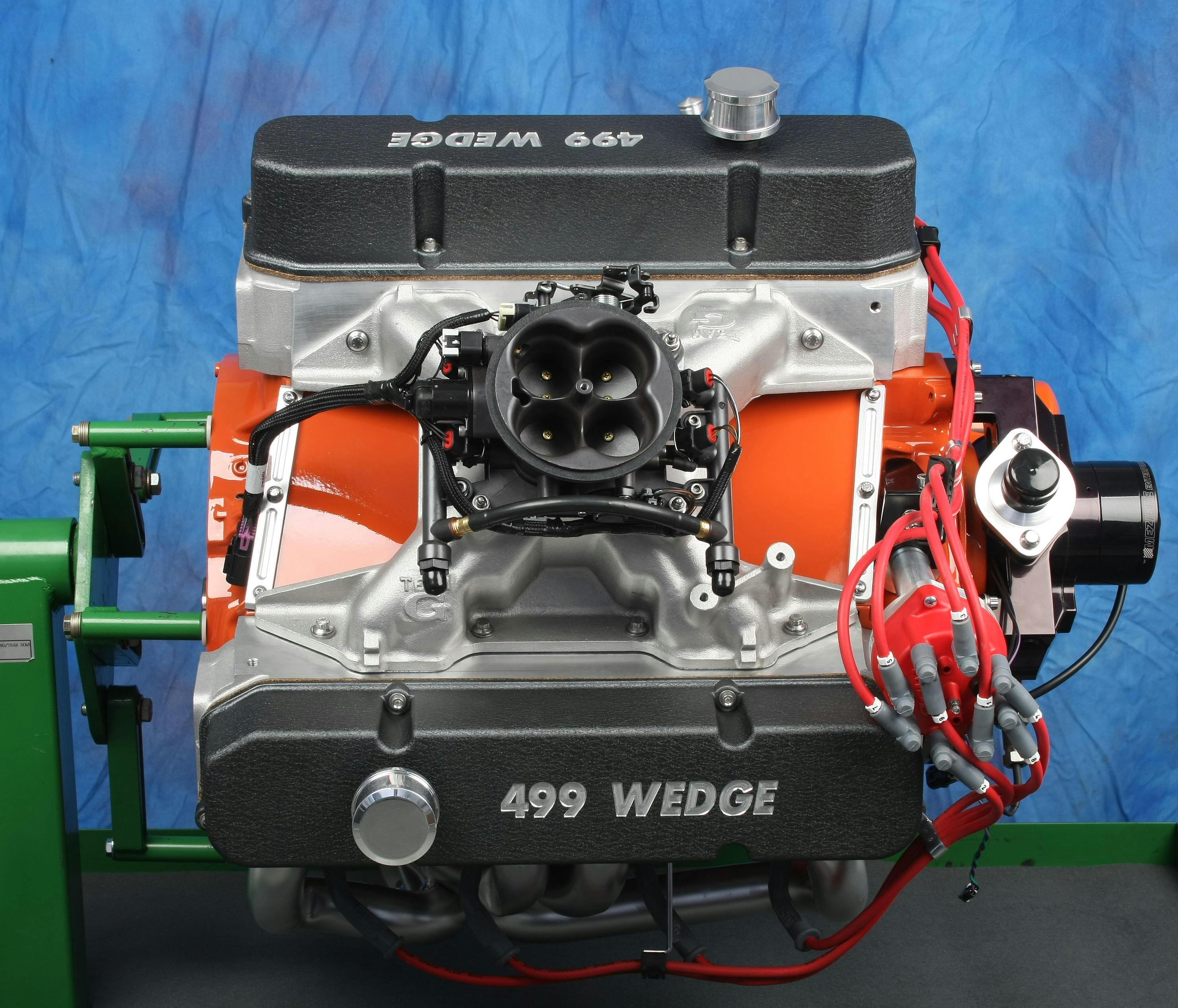 499CID Chrysler B engine with an older Holley Terminator EFI setup. Aftermarket throttle body injection is a popular upgrade for enthusiasts because the systems are more self-contained than a port fuel injected option. This allows the vehicle to maintain a more &ldquo;stock&rdquo; look.