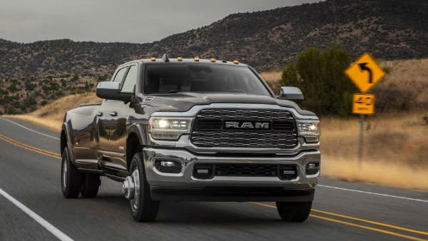 Again drive between one to five mph while turning the steering wheel between &frac14; turn and full lock. If the noise persists, replace the front driveshaft using new driveshaft bolts.