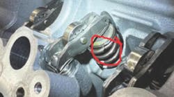 Example of a broken valve spring. Example of a broken valve spring.