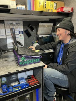 Libby's workspace is out of the way of customers, offering an ample amount of space for her to work. Libby's workspace is out of the way of customers, offering an ample amount of space for her to work.