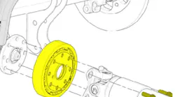 Installing the torsional damper on the axle pinion flange.