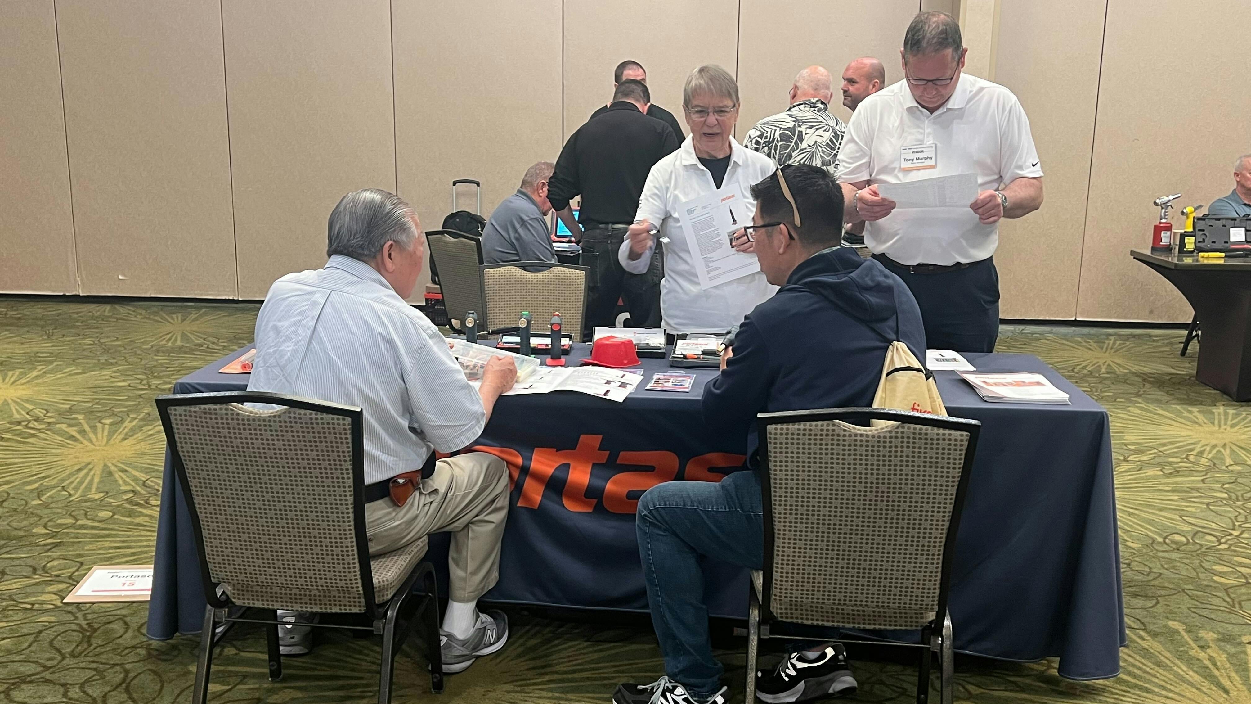 During the exhibit show, each member was given eight minutes to visit with each vendor to view and learn about new and upcoming products.