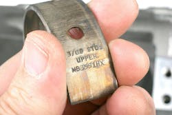 Example of an upper bearing marked with a “1X”. This indicates that the bearing shell is thinner than standard. If both upper and lower bearing 1X shells are installed, this gains an additional 0.001” of oil clearance. If you only need an additional 0.0005” clearance, use a combination of a standard and a 1X. Example of an upper bearing marked with a “1X”. This indicates that the bearing shell is thinner than standard. If both upper and lower bearing 1X shells are installed, this gains an additional 0.001” of oil clearance. If you only need an additional 0.0005” clearance, use a combination of a standard and a 1X.