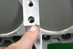 Closely inspect the bearing tang notches in the block saddles and main caps. Make sure that the notch is clean and free of burrs. Any debris/irregularities can affect oil clearance. Closely inspect the bearing tang notches in the block saddles and main caps. Make sure that the notch is clean and free of burrs. Any debris/irregularities can affect oil clearance.