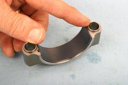 Install rod bearings by aligning the bearing tang with the locating notch and press each end down with your fingers. Each end of the bearing shell should protrude by the same amount at each end. Install rod bearings by aligning the bearing tang with the locating notch and press each end down with your fingers. Each end of the bearing shell should protrude by the same amount at each end.