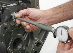 With main bearings and main caps fully installed, the bore gauge is used to measure installed bearing inside diameter. The different in the reading indicates oil clearance. Take the reading at 12 and 6 o’clock positions. Do not measure near/at the parting line. With main bearings and main caps fully installed, the bore gauge is used to measure installed bearing inside diameter. The different in the reading indicates oil clearance. Take the reading at 12 and 6 o’clock positions. Do not measure near/at the parting line.