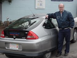 The year is 2000 and Craig stands next to his new Honda Insight Gas/ Electric Hybrid. The year is 2000 and Craig stands next to his new Honda Insight Gas/ Electric Hybrid.