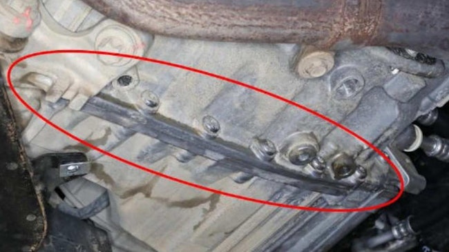 Inspect the leak at transmission case split.