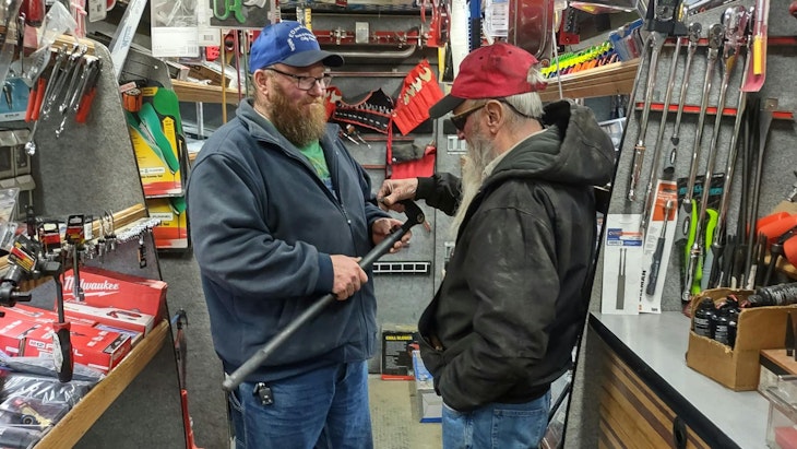 Ed Wright with customer on tool truck