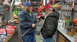 Ed Wright with customer on tool truck Ed Wright with customer on tool truck