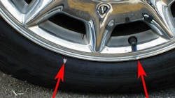 Example of a tire that has slipped on the rim. Example of a tire that has slipped on the rim.