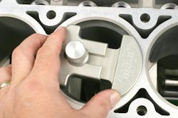 In order to check ring end gap, place a top ring into a bore and square the ring so that it is seated at equal depth along the entire perimeter. A ring squaring tool (example shown here) allows quick ring squaring. Repeat for all top and second rings. In order to check ring end gap, place a top ring into a bore and square the ring so that it is seated at equal depth along the entire perimeter. A ring squaring tool (example shown here) allows quick ring squaring. Repeat for all top and second rings.