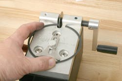 If a ring requires filing to increase the gap, it’s best to do this using a dedicated ring filing tool. A manual tool is shown here. Electric-motor gapping machines are also available that allow calibrating for desired gap. If using a manual tool, file each end an equal amount, and remove material in small increments (re-checking gap after each filing) to avoid creating an excessive gap. If a ring requires filing to increase the gap, it’s best to do this using a dedicated ring filing tool. A manual tool is shown here. Electric-motor gapping machines are also available that allow calibrating for desired gap. If using a manual tool, file each end an equal amount, and remove material in small increments (re-checking gap after each filing) to avoid creating an excessive gap.