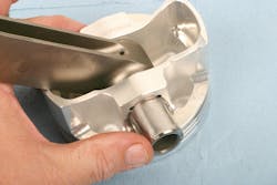 Once one locking clip has been installed, lube the pin and slide it into the bore until it contacts the installed clip. Using a brass drift, tap the free end of the pin against the clip, to verify that the clip is properly engaged in its groove. Then install the opposite clip to secure the pin. Tap the opposite end of the pin against this clip, again to verify clip installation. Once one locking clip has been installed, lube the pin and slide it into the bore until it contacts the installed clip. Using a brass drift, tap the free end of the pin against the clip, to verify that the clip is properly engaged in its groove. Then install the opposite clip to secure the pin. Tap the opposite end of the pin against this clip, again to verify clip installation.