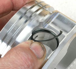 If the pistons are supplied with spiral clips, these clips must be gently spread apart to aid installation, then “walked” into place using a small tool such as a flat blade screwdriver. Note that you must use the pin clips that are provided with the new pistons, as groove diameter and groove width will vary depending on application. If the pistons are supplied with spiral clips, these clips must be gently spread apart to aid installation, then “walked” into place using a small tool such as a flat blade screwdriver. Note that you must use the pin clips that are provided with the new pistons, as groove diameter and groove width will vary depending on application.
