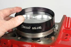 While most billet ring compressors are one-piece and dedicated to a specific bore diameter, billet compressors are also available that are split and equipped with a worm-drive clamp, allowing the tool to be adjusted within a range of diameters. While most billet ring compressors are one-piece and dedicated to a specific bore diameter, billet compressors are also available that are split and equipped with a worm-drive clamp, allowing the tool to be adjusted within a range of diameters.