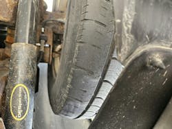 This tire shows a classic case of cupping, where the tread wears in a scalloped, uneven pattern. Cupping is usually caused by worn ride control that can’t control tire bounce, sometimes made worse by imbalance or loose suspension parts. Left unchecked, it leads to noise, vibration, and premature tire replacement. This tire shows a classic case of cupping, where the tread wears in a scalloped, uneven pattern. Cupping is usually caused by worn ride control that can’t control tire bounce, sometimes made worse by imbalance or loose suspension parts. Left unchecked, it leads to noise, vibration, and premature tire replacement.