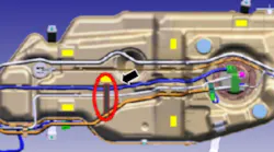 Clean the top of the fuel tank in the indicated location.