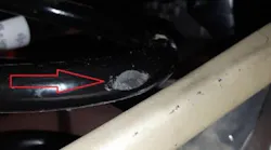 Example of run mark on a rear coil spring.