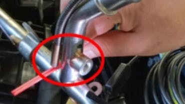 Location of exhaust manifold outlet pipe.