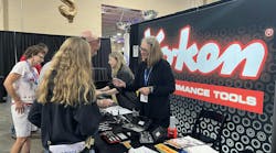 Attendees visiting the Ko-ken booth. Attendees visiting the Ko-ken booth.