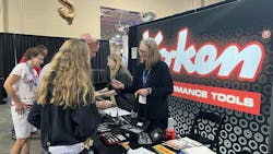 Attendees visiting the Ko-ken booth. Attendees visiting the Ko-ken booth.