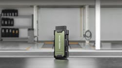 an RLink J2534 unit stands upright on a table in an automotive bay an RLink J2534 unit stands upright on a table in an automotive bay