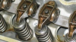 As pressurized oil is forced into the engine, you will hear a gurgle noise as the oil begins to displace air. Continue pressurizing the system until you verify that oil is being delivered to the rockers. As pressurized oil is forced into the engine, you will hear a gurgle noise as the oil begins to displace air. Continue pressurizing the system until you verify that oil is being delivered to the rockers.