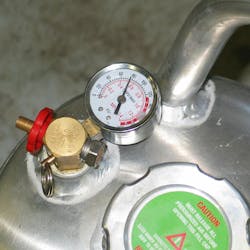 Once oil has been added, install the fill cap and pressurize the tank using shop air. The tank is now portable and ready to connect to the engine block. Once oil has been added, install the fill cap and pressurize the tank using shop air. The tank is now portable and ready to connect to the engine block.