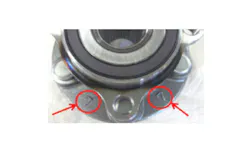 The new hub bearing design features the number 7 on the back of the flange. The new hub bearing design features the number 7 on the back of the flange.
