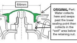 The original strut cap/seal was 64mm in diameter and allowed water to collect below the retaining nut. The original strut cap/seal was 64mm in diameter and allowed water to collect below the retaining nut.