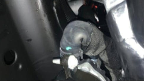 Example of kinked coolant hose.